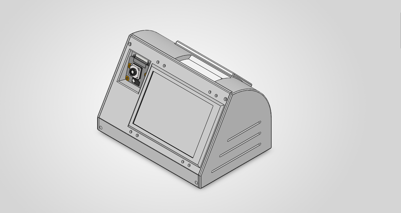 Isometric CAD render of the closed enclosure: a wedge-shaped body with a recessed panel bezel, a camera aperture above it, and a vented rear shell.